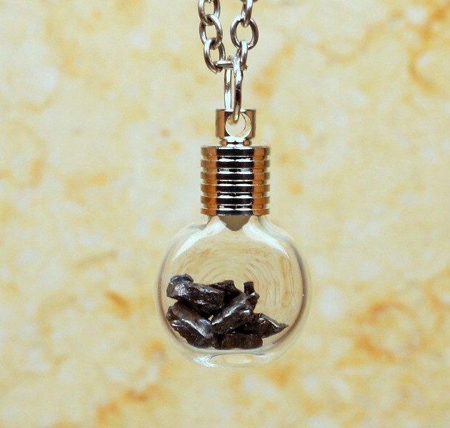 Sternschnuppen-Anhänger im Flaschen-Design