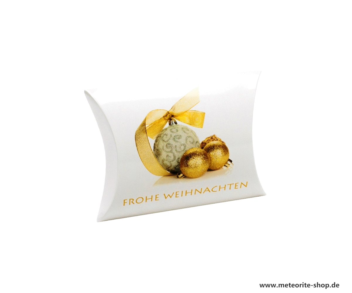 Goldene Christbaumkugeln als Weihnachtsmotiv